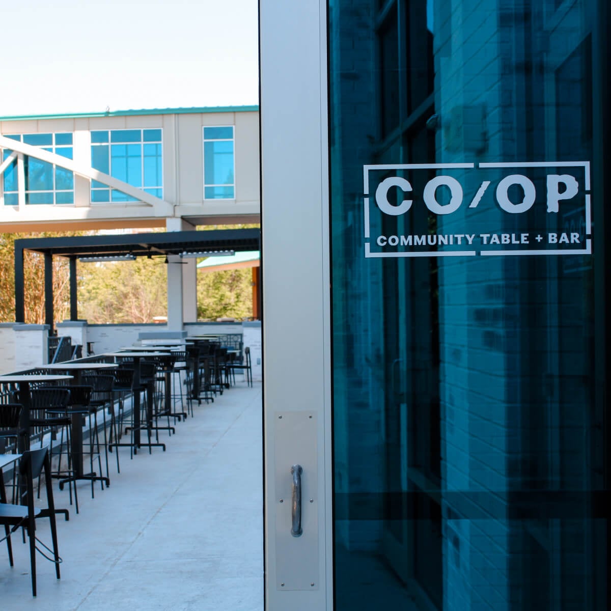 Photo of CO/OP Community Table + Bar